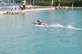 Click to enlarge image This little girl FLEW across the water - Ever wonder what it is like to swim with a Dolphin? - Dolphin Discovery Grand Cayman