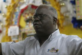 Click to enlarge image The husband of Mrs. Arlene Nash Ferguson helps with the programs. - Junkanoo Cultural Festival - Nassau, Bahamas