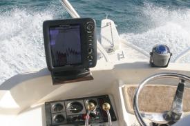 The waves splash over the bow of the boat. The waves splash over the bow of the boat. - Deep Sea Fishing in Grand Cayman - We caught nothing but barracuda but we had a lot of FUN doing it!!