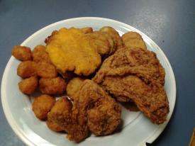 Chicken, corn fritters and flat corn bread hush puppies. Chicken, corn fritters and flat corn bread hush puppies. - Momma Dean`s Soul Food Kitchen - South 71B, Fayetteville, Arkansas