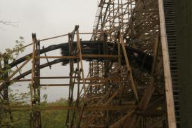 Bottom view of Wagon Train coming out of the Twist and Turn (5). Bottom view of Wagon Train coming out of the Twist and Turn (5). - Silver Dollar City - Outlaw Run - A New Roller Coaster that is as Exciting as it Seems!