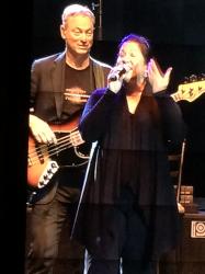 Click to enlarge image Gary Sinise playing Bass behind Mari Anne Jayme on vocals - #‎greenlightavet‬ at Gary Sinise and the Lt. Dan Band - #‎greenlightavet‬ at The Walmart AMP in Rogers, Arkansas