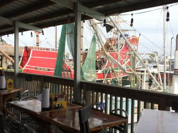 Click to enlarge image Red Dragon Pirate Cruises. - Fins Grill and Icehouse in Port Aransas, Texas! - Great restaurant right on the harbor, a fun and delish place to eat!!