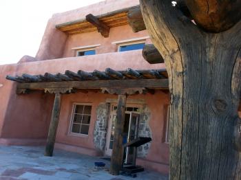 Click to enlarge image View of east entrance on lower floor. - Painted Desert Inn - Explore this intriguing national historic Landmark and discover its fascinating past from homesteads to Route 66! It is in the middle of the Painted Desert right on I-40!