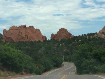 Click to enlarge image  - Garden of the Gods in Colorado Springs - Tigger basques in the beauty of this appropriately named place!