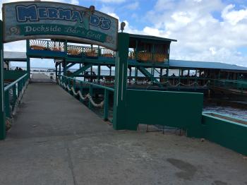 Click to enlarge image This is the entrance from the island, but we came from the far end. In the distance you can see Captain Taiwo's 19 foot long Trophy from TRC Boating. - TRC Boating in the British Virgin Islands - Part 3 of 5 - Lunch in Spanish Town at Mermaid's Dockside Bar and Grill