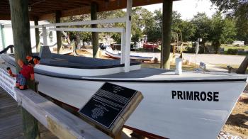 Click to enlarge image Tigger is amazed at the size of this seine fishing boat the Primrose in Destin, Florida at the Destin History & Fishing Museum - The Primrose at the Destin History & Fishing Museum - Working Vessel of Captain John W. Melvin, A Wonderful Slice of Local Lore - The History that Built the World's Luckiest Fishing Village.