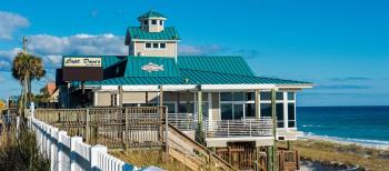 Click to enlarge image View of the restaurant on the beach. - Captain Dave's on the Gulf, Destin, Florida - Seafood that is fresh, memorable and always leaving you wanting more! #Destin #Beach