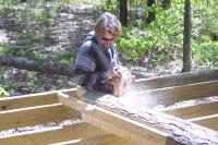 Click to enlarge image  - How to put a Round Log in a Square Hole - With a chainsaw!!!