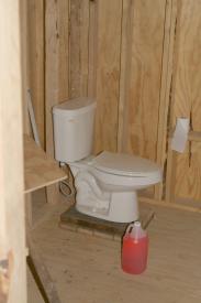 Click to enlarge image  - The Arkansas Cabin has framed walls and running water! - 