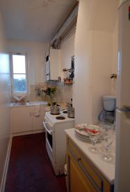 Click to enlarge image Fully stocked galley style kitchen with all the dishes, pots and pans we needed. - Renting an Apartment in Paris - Definitely THE way to go!!!