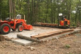 Click to enlarge image  - Log mill work on the Bailey Bear Ridge building project - Old world `fun` is really hard work.