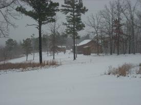 Here is the view across the road at the neighbors house at about 2 inches. Here is the view across the road at the neighbors house at about 2 inches. - Arkansas Snow, January 28, 2010 - One foot of snow, no school, snow forts, good times!