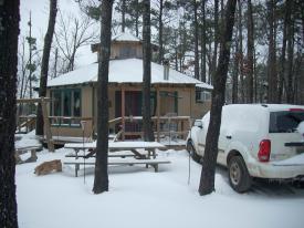 The front of the cabin the morning after when the snow finally stopped. The front of the cabin the morning after when the snow finally stopped. - Arkansas Snow, January 28, 2010 - One foot of snow, no school, snow forts, good times!