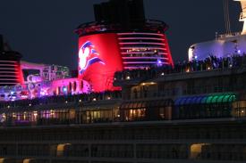 Click to enlarge image There were a lot of people on board with streamers when we passed - The New Disney Dream Arrives in Port Canaveral - Panama Cruise January 2011 - Last Trans-canal trip planned for the Disney Wonder at this time.