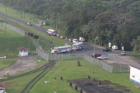 People waiting for the draw bridge to resume cross traffic People waiting for the draw bridge to resume cross traffic - The Gatun Locks and the Panama Canal Crossing! Part 2 - Panama Cruise January 2011 - Last Trans-canal trip planned for the Disney Wonder at this time.