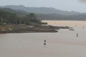 Here you can see some of the continuing work on the Panama Canal and the markers of the left side of the canal circling around in the distance. Also in the distance you can see the next two markers for canal navigation. Here you can see some of the continuing work on the Panama Canal and the markers of the left side of the canal circling around in the distance. Also in the distance you can see the next two markers for canal navigation. - The Gaillard (Culebra) Cut, Panama Canal! Part 4 - Panama Cruise January 2011 - Last Trans-canal trip planned for the Disney Wonder at this time.