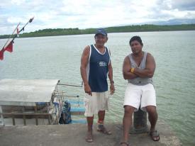 Jose and Franklin enjoying the breezes at their fishing dock Jose and Franklin enjoying the breezes at their fishing dock - Day Nine in Puntarenas, Costa Rica - Panama Cruise January 2011 - Last Trans-canal trip planned for the Disney Wonder at this time.