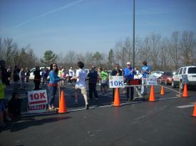 Click to enlarge image Val finishes RIGHT AT 1:00:00 - Eureka Victorian Classic 10k Run -