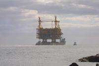 Click to enlarge image - Going to Sea - Newly Constructed Oil Rig from the McDermott Yard